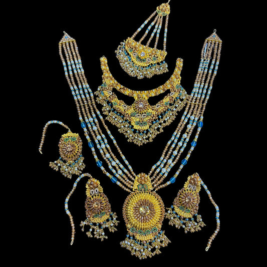 Radiant Champagne Bridal Set with Fine Stone Work