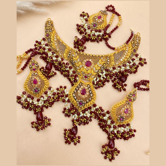 Majestic Maroon Gold-Plated Necklace Set with Intricate Detailing