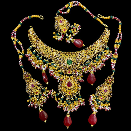 Dazzling Maroon Zircon Adorned Necklace Set in Gold Finish